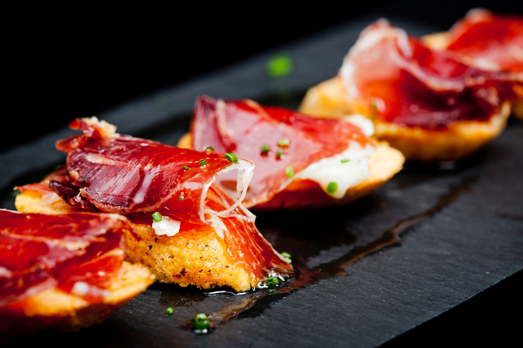 Cured spanish ham and bread snack ready to eat