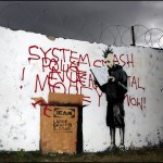 Banksy_large_graffiti_slogan