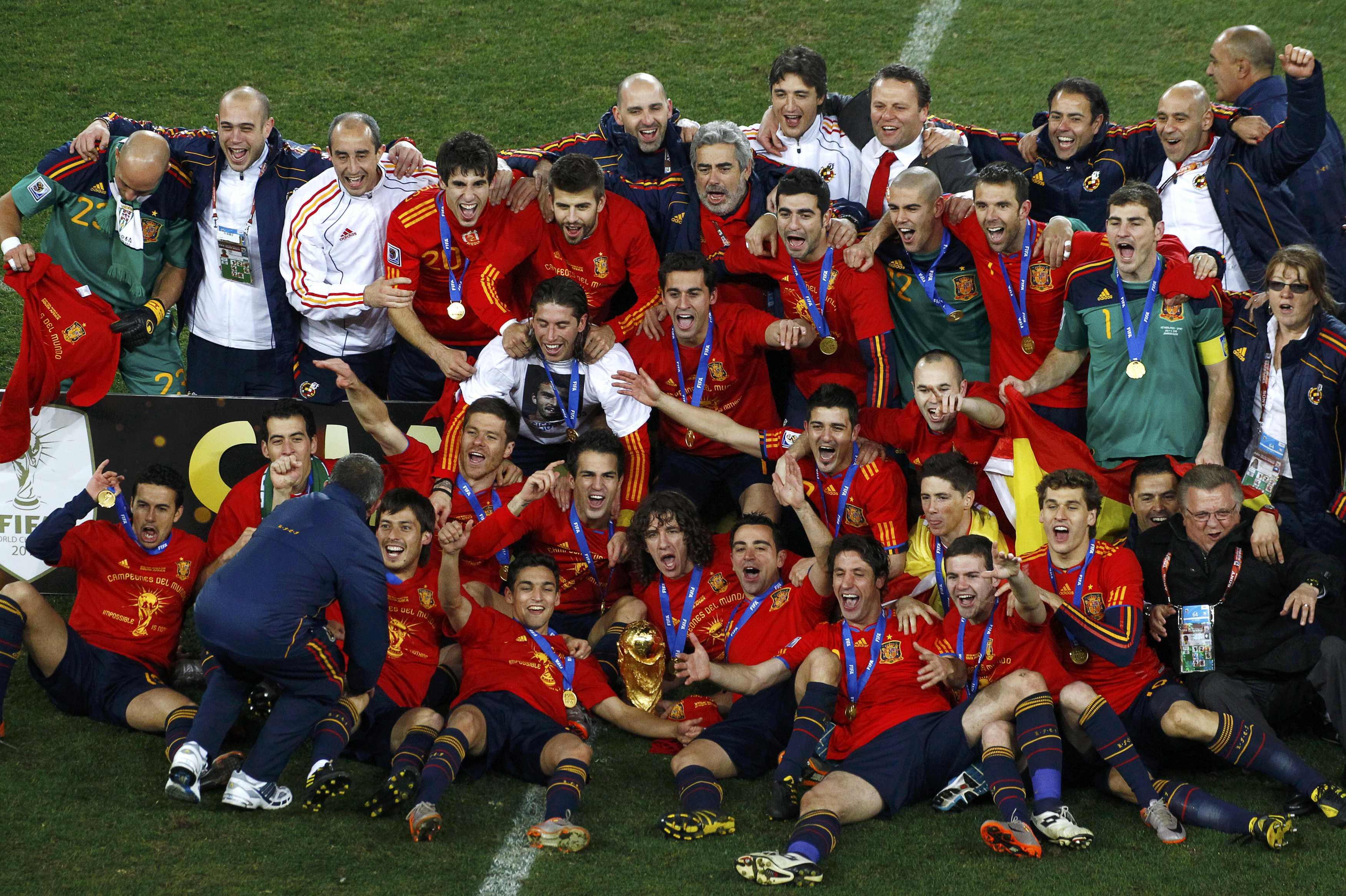 Spain's soccer team celebrates with World Cup trophy after their final match victory over Netherlands, during award ceremony at Soccer City stadium in Johannesburg